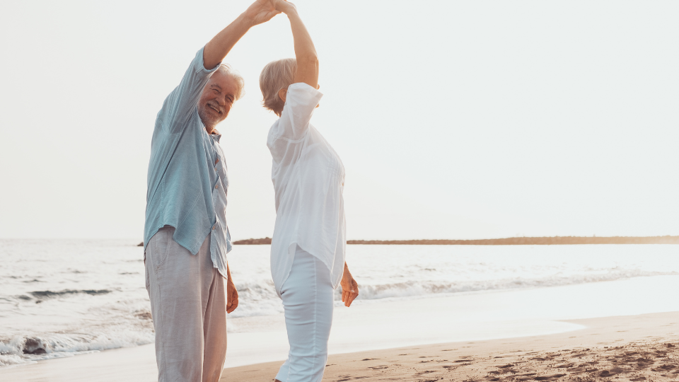 Seniors Dancing on Beach